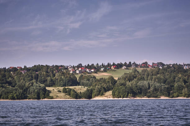 Czorsztyn, Poland - July 05, 2015 : View of houses by Czorsztyn lake