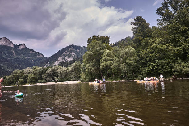 Szczawnica, Poland - July 06, 2015 : Raftmens and tourists on rafts at the Pieniaski National Park