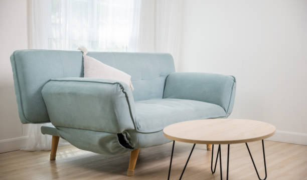 istock Sofa in living room with windows minimal style 1434594971