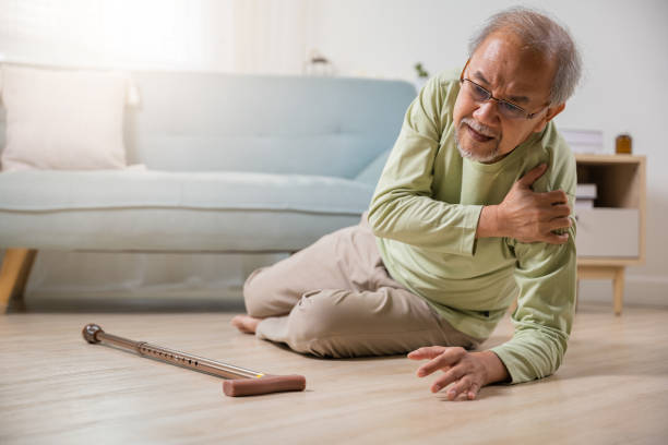 istock Sick senior old man falling down lying on the ground because stumbled at home 1434595017