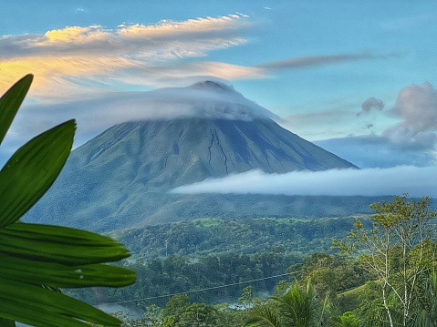 Volcano in Costa Rica through the rainforest.