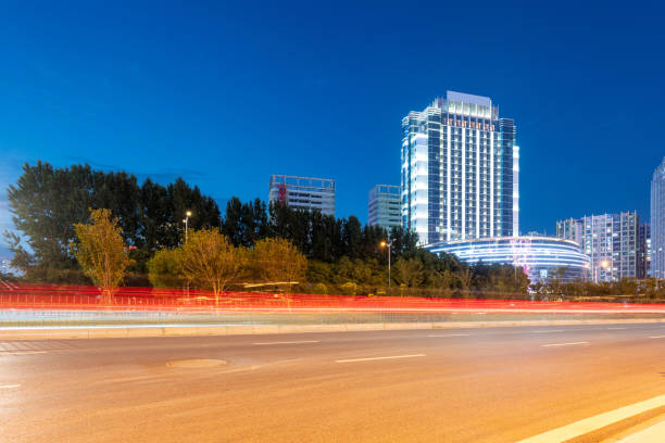 istock moving car with blur light through city at night 1434598425