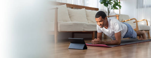 istock Black African American man doing plank exercise 1434598808