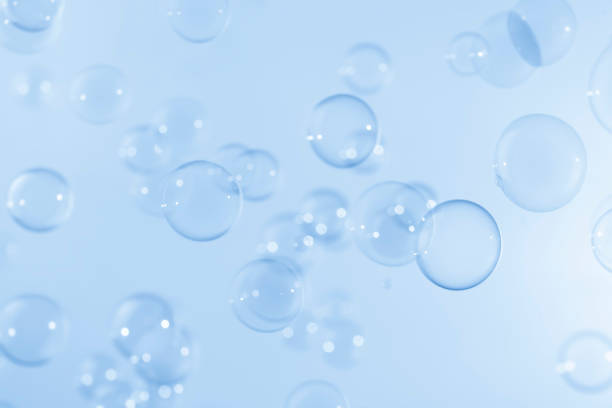 istock Abstract Beautiful Transparent Blue Soap Bubbles Background. Freshness Soap Sud Bubbles Water. 1434600292