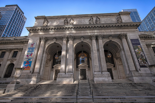 New York, USA - June 17, 2010: Facade of the Frick Collection art museum on blue sky background