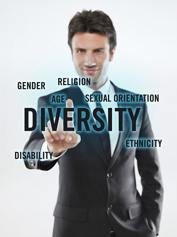 Businessman touching on a touchscreen with diversity text