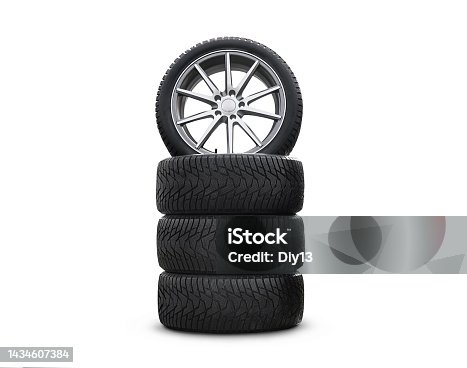 istock Four new good-looking snow tires isolated on white background. A set of studded winter car tires. A set of wheels and tires. tire service 1434607384