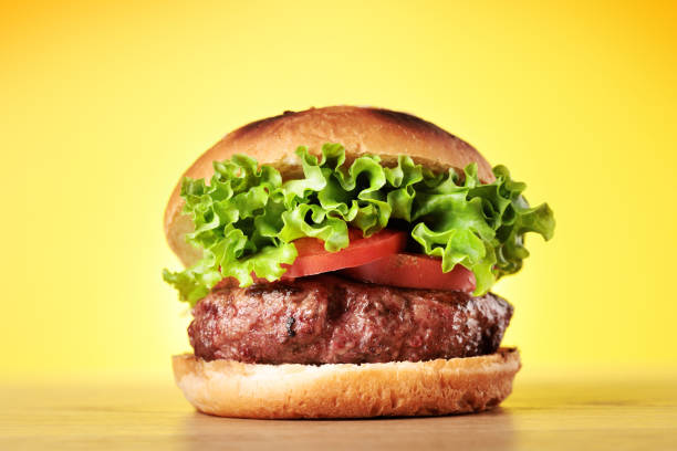 istock Homemade hamburger with large beef cutlet and fresh vegetables 1434608836