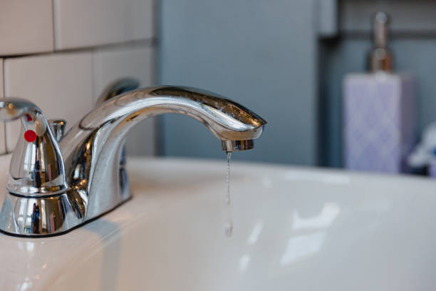 istock Dripping Bathroom Sink Faucet 1434615679