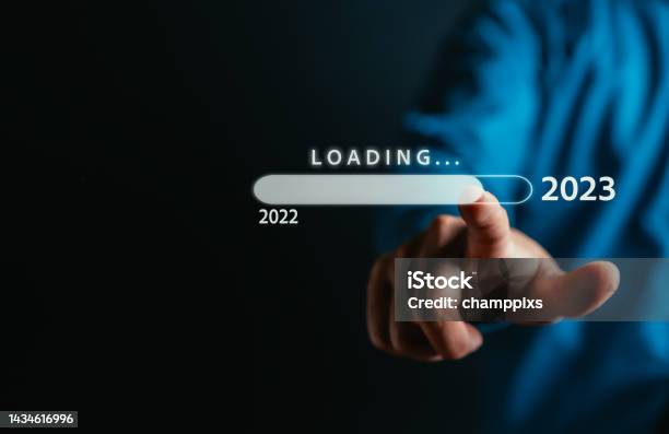 Businessman Touching To Virtual Download Bar And Loading For New Year And Changing Year 2022 To 2023 Start Up Planing Business In Next Years Concept Stock Photo - Download Image Now
