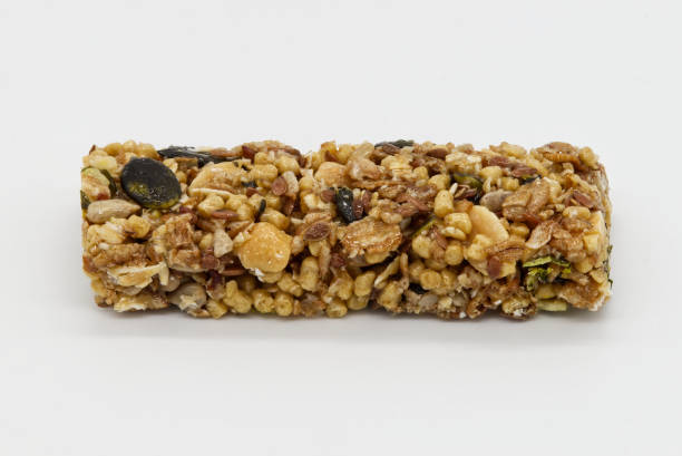 istock Protein bar with whole grains peanuts and cranberries isolated on white background. 1434617206