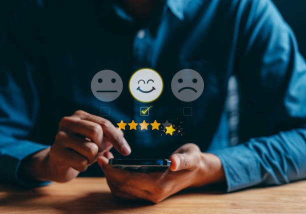 istock Customer satisfaction. businessman using a smartphone to giving 5 stars. Quality Excellent business rating experience. Satisfaction Rating, good and impressive. 1434617555