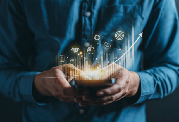 istock Businessman using mobile phone for analyzing forex trading graph financial data. Business finance technology and investment concept. Stock Market Investments Funds and Digital Assets. Business finance. 1434618143