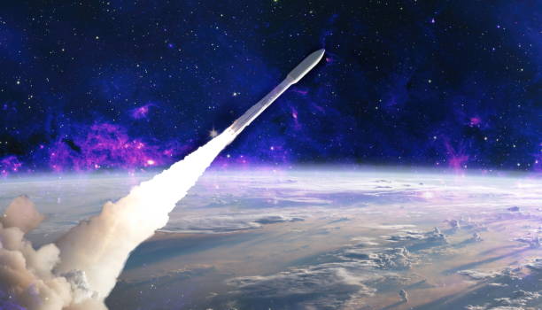 istock Shuttle launch in the clouds to outer space. Dark space with stars on background.Spaceship flight. Elements of this image furnished by NASA 1434618334