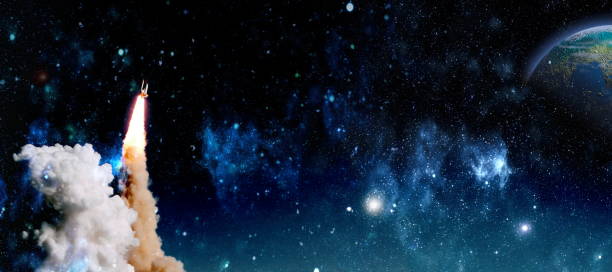 istock shuttle launch in the clouds to outer space. Dark space with stars on background.Spaceship flight. Elements of this image furnished by NASA 1434618401
