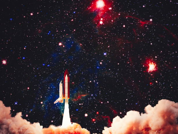 istock Shuttle launch in the clouds to outer space. Dark space with stars on background.Spaceship flight. Elements of this image furnished by NASA 1434618581