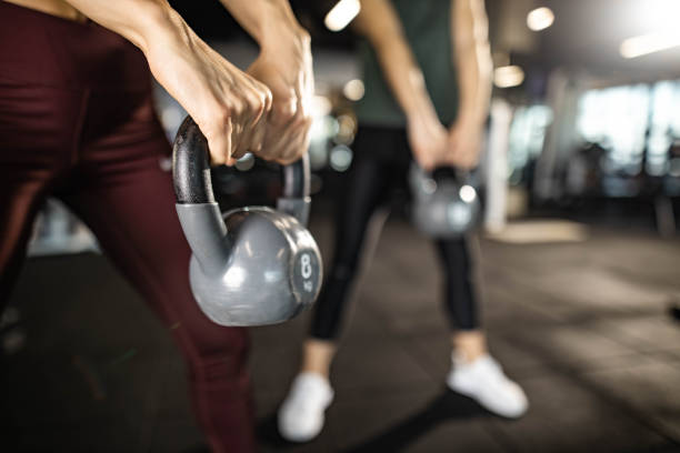 istock Close up of exercising with kettle bell in a gym. 1434619020