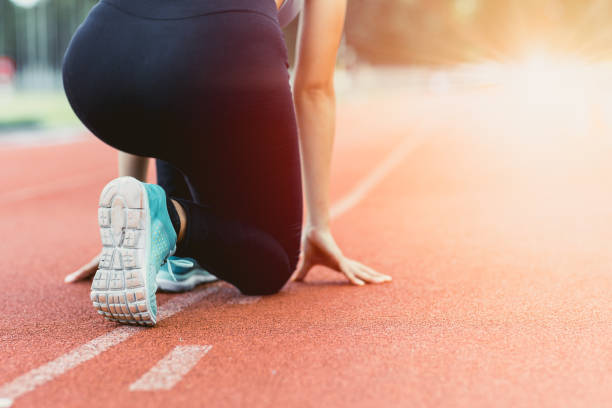 istock sport runner at starting point. business begin start run to goal target concept 1434627627