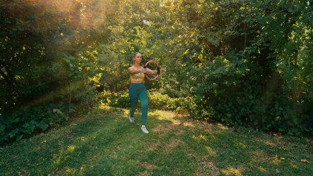 istock Woman does exercises on her upper body using  pilates circle 1434628703