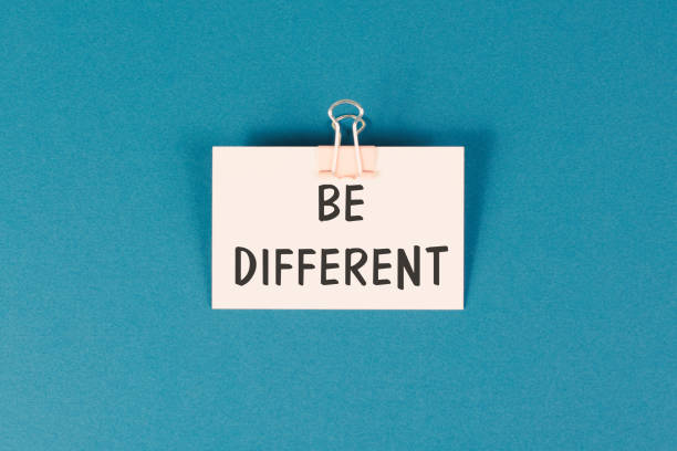 Be different is standing on the paper, make a difference, coaching and motivation concept