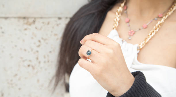 istock Young woman showing her engagement ring. 1434635908