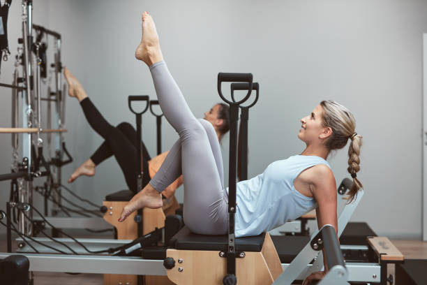 istock Young women exercising in a gym. 1434642385