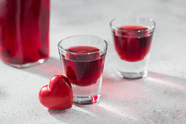 istock Red cocktail, vodka or liqueur and Heart shape decorations 1434648517