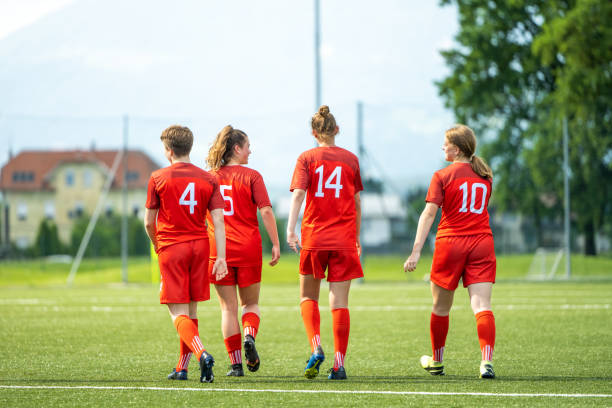 istock Female players walking on pitch 1434650496