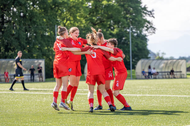 istock Football team celebrating goal 1434650512