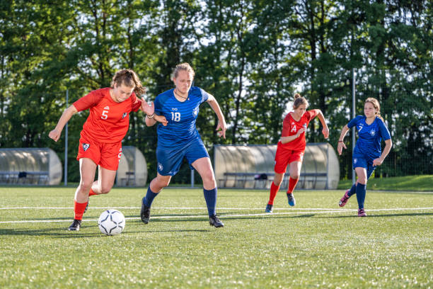 istock Female player kicking ball 1434650516