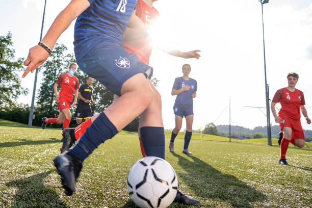 istock Female player kicking ball 1434650520
