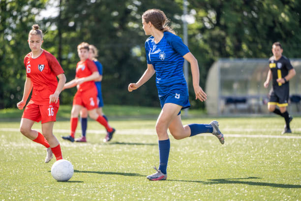 istock Female player kicking ball 1434650523