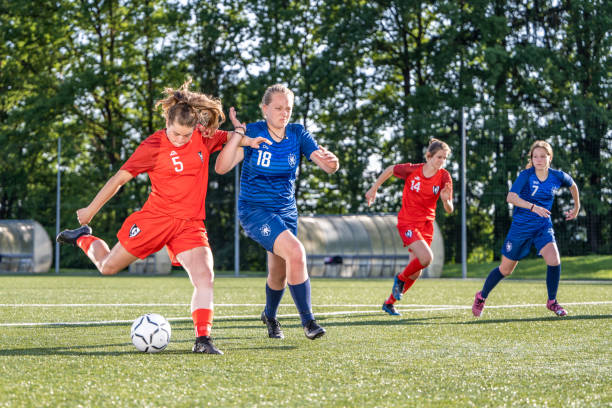 istock Female player kicking ball 1434650527