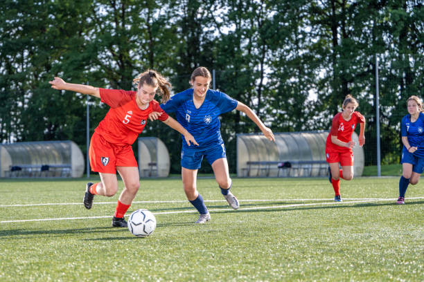istock Female player kicking ball 1434650532