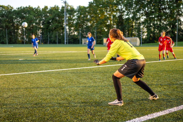 istock Goalkeeper standing near goal post 1434650548