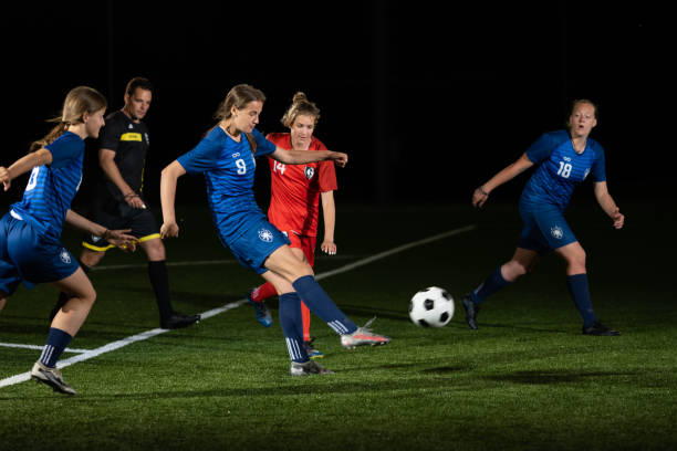 istock Female player kicking ball 1434650568