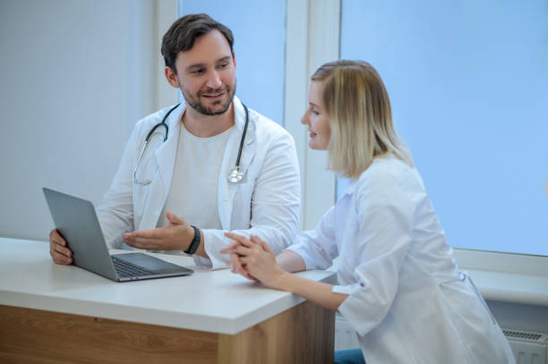 istock Two doctors sitting close and discussing something 1434650617