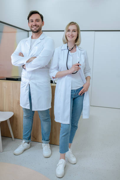 istock Two doctors in lab coats in the clinic 1434650923