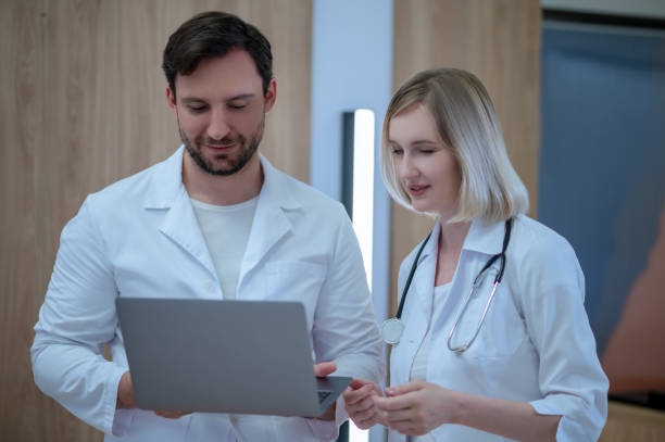 istock Doctors discussing an interesting case and looking involved 1434650950