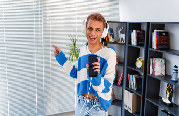 istock transgender person singing and dancing home 1434652575