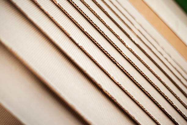 istock Corrugated cardboard for packing. abstract background horizontal lines with wavy lines of beige color 1434653232