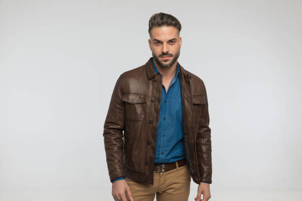 istock cool bearded man in casual outfit being confident and posing 1434656167