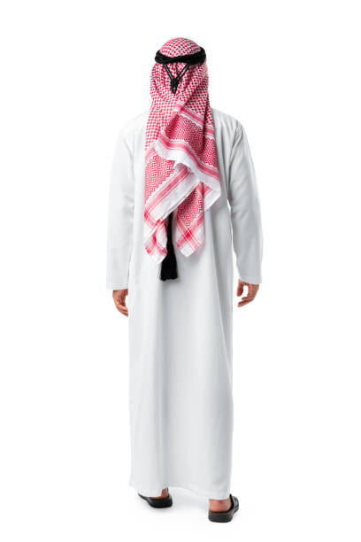 istock Back view of an Arab man standing on white isolated background 1434662757