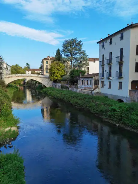 old town of Vicenza with the river Retrone in Venetia in Italy
