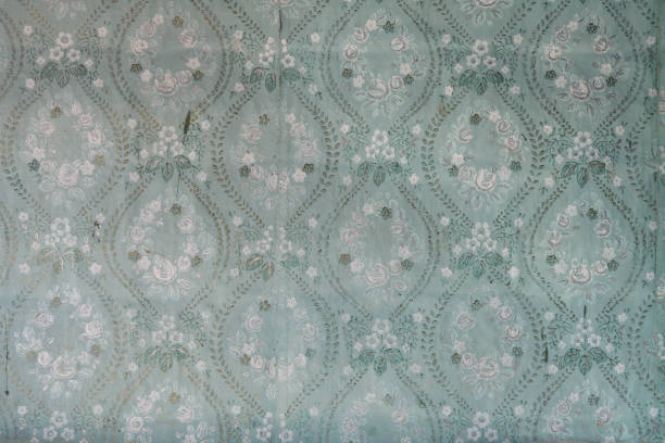istock Old wallpaper on the wall. Old wallpaper for texture or background. 1434668004