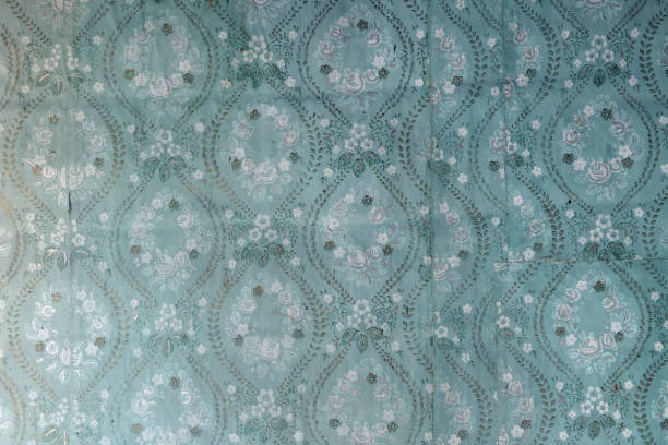 istock Old wallpaper on the wall. Old wallpaper for texture or background. 1434668008