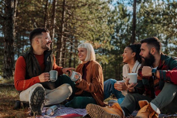 istock Friends socializing on picnic. 1434668060
