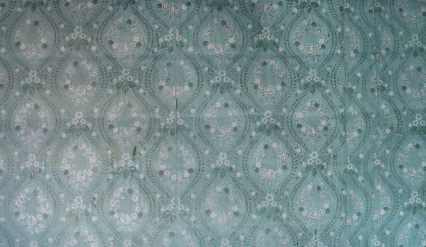 istock Old wallpaper on the wall. Old wallpaper for texture or background. 1434668621