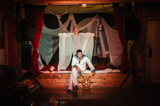 istock Theatre scene performance. Actor artists thespian perform play on stage 1434669012