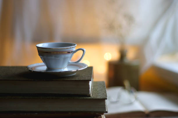 istock Cookies, Tea, Books and Candle 1434669582